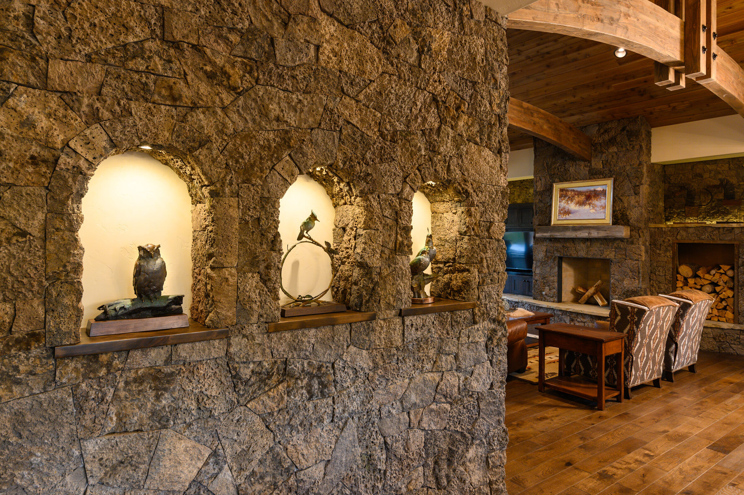 Bronze bird sculptures in art nooks
