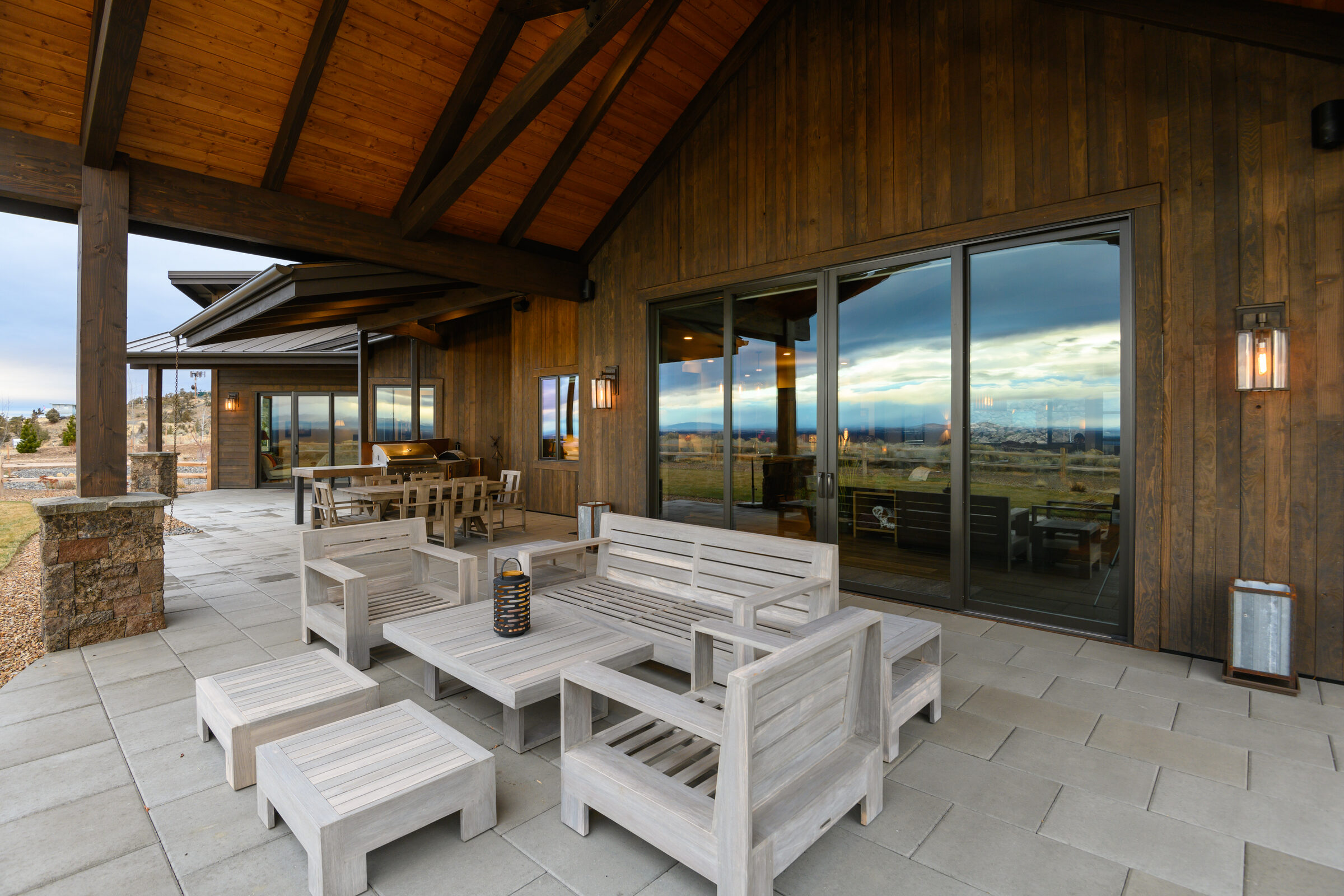 Covered patio with built-in seating overlooking a 270-degree horizon
